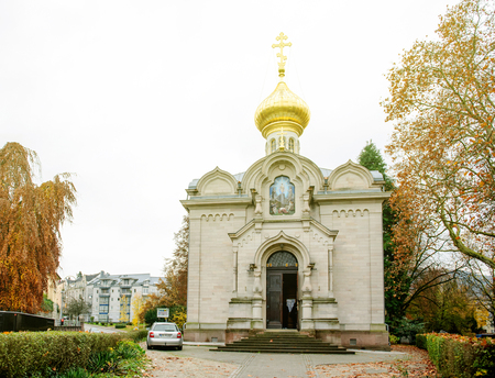 BADEN, GERMANY - NOV 20, 2014: Sunny day over facade of the Russian Orthodox Church in city of Baden-Baden. A glistening golden dome is the hallmark of this Byzantine-styled church, which should definitely be included on your tour of the town.  Vladimir Pのeditorial素材
