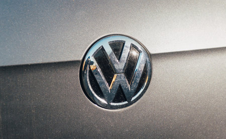 PARIS, FRANCE - NOV 29, 2016: Volkswagen VW logotype on a gray silver car. On 18 September 2015, the...