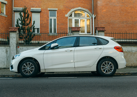PARIS, FRANCE - NOV 29, 2016: BMW 2-series Active Tourer family van parked on a calm city. The 2-Series currently competes with new models from Audi and Mercedes-Benz, the A3 Sedan and the CLA Class, respectively, until BMW releases its own front wheel drのeditorial素材