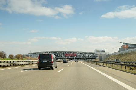 STUTTGART, GERMANY - MAR 26, 2016: View from the autobahn of the parking building of the Stuttgart airport. Stuttgart Airport (German: Flughafen Stuttgart, formerly Flughafen Stuttgart-Echterdingen) (IATA: STR, ICAO: EDDS) is the international airport of のeditorial素材