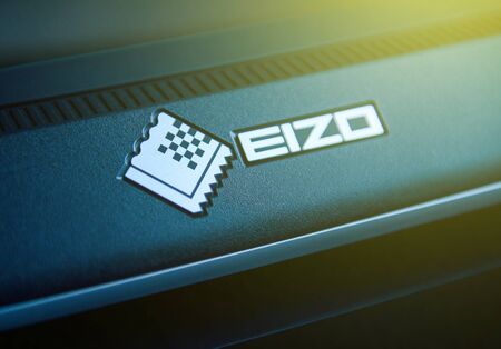 PARIS, FRANCE - JAN 13, 2016: MOdern Eizo logotype on the back of the professional grade color critical monitor in designer's office. Eizo is the leading producer of high performance monitors for the gaming, security and color industryのeditorial素材
