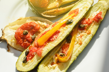 Organic ingredients - tasty eggplant aubergine coocked in owen with mix of tomato, capers, onions and cheese の写真素材