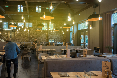 STRASBOURG, FRANCE - NOV 6, 2016: Interior of the famous authentic French  STORIG restaurant - preparing to receive large group of guestsのeditorial素材