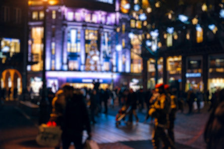 Defocused city with Christmas Atmosphere - tourists and locals walking to find the best gifts in the nearby shopping centerのeditorial素材