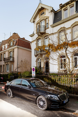 STRASBOURG, FRANCE - NOV 29, 2016: Modern Luxury Mercedes-Benz S Klass limousine parked in front of a luxury houseのeditorial素材