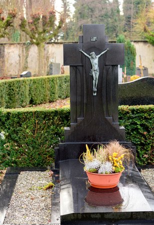 Marble tombstones in French cemetery with beautiful crafted crosses and の写真素材