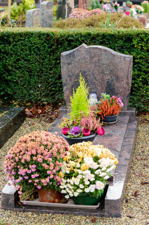 Marble tombstones in French cemetery with beautiful crafted crosses and の写真素材