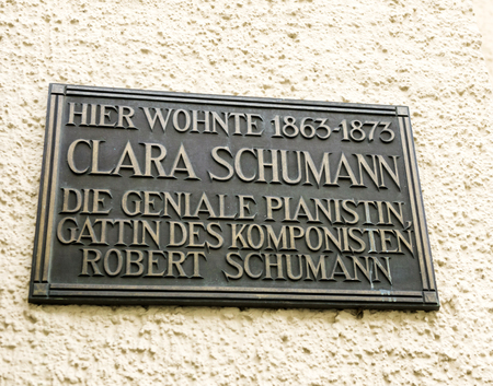 BADEN-BADEN, GERMANY - NOV 20, 2014: Clara Schumman, the wife of Robert Schumann compositor has lived here - memorial plaque in central Baden-Baden, Germany.のeditorial素材