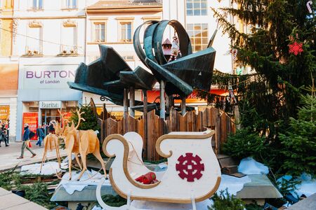 MULHOUSE, FRANCE - DEC 12, 2015: Traditional street decoration with Chritmas theme in the central Mulhouse, France on a busy shopping streetのeditorial素材