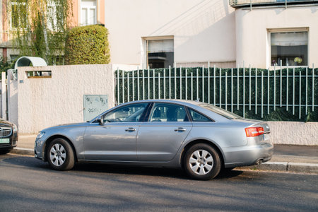 STREASBOURG, FRANCE - APR 3, 2017: AUDI silver limousine car parked in front of luxury house