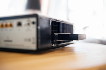 Wireless tv box used for TV Internet Telephone communication via fiber optic of coaxial cable with HDD hard disk drive ready to be inserted for record HD 4k movies and contentの写真素材