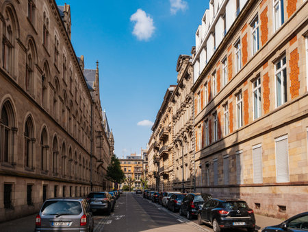 STRASBOURG, FRANCE - APR 27, 2017: Rue Wencker street with typical French architecture apartment buildings and cars parked on the trottoirのeditorial素材