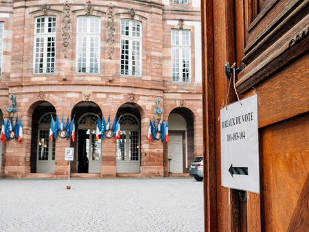 STRASBOURG, FRANCE - MAY 7, 2017: French polling station Bureau de vote sign on door with French flags ready for second round of the French presidential election to choose between Emmanuel Macron and Marine Le Penのeditorial素材