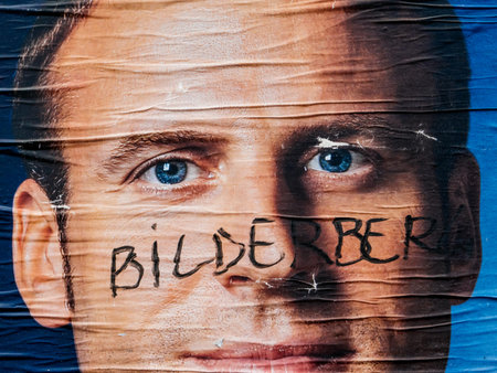PARIS, FRANCE - MAY 9, 2017: Detail of the Emmanuel Macron portrait poster next to polling place...