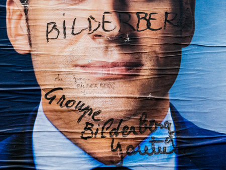 PARIS, FRANCE - MAY 9, 2017: Detail of the Emmanuel Macron portrait poster next to polling place after the second round French presidential election  marker inscription Member of Bilderberg groupのeditorial素材