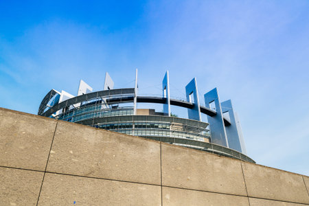 STRASBOURG, FRANCE - MAR 31, 2017: Official European Union flags - European Parliament building in...