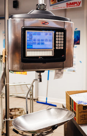 PARIS, FRANCE - APR 2, 2017: Front view of the Electronic Scales for weighing fish and other food on...