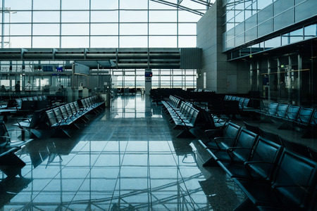 Empty seats in Frankfurt International airport in blue tones - no passengers and clients for first class flightsのeditorial素材