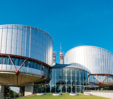 European Union flag fly half-mast European Court of human Rights building memory of victims terrorist explosion Manchester Arena Ariana Grande concertのeditorial素材