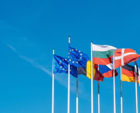 European Union flags fly half-mast in memory of victims terrorist explosion Manchester Arena Ariana Grande concertの写真素材