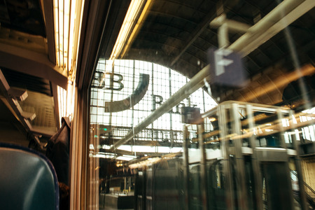 KARLSRUHE, GERMANY - JUL 29, 2015: View from the train window of the train station and the BB Bank inscription on the facade at the exit from the train stationのeditorial素材