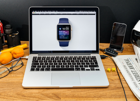 PARIS, FRANCE - JUNE 6, 2017: Apple Computers website on MacBook Retina in creative environment showcasing latest WatchOS 4 at WWDC 2017 - new Watch face screenのeditorial素材