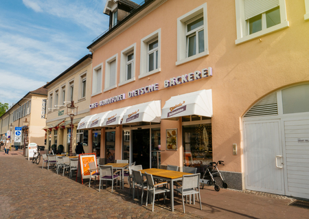 RASTATT, GERMANY - APR 13, 2017: cafe, konditorei, dietsche, backerei, cafe facade in German city of Rastatt with empty terraceのeditorial素材