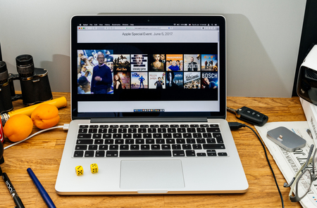 PARIS, FRANCE - JUNE 6, 2017: Apple Computers website on MacBook laptop in creative environment showcasing news from Apple at WWDC 2017 - Tim Cook announcing Amazon Prime Video on Apple TVのeditorial素材