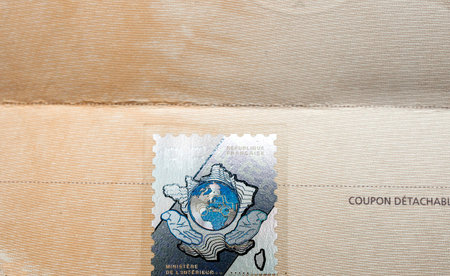 PARIS, FRANCE - OCT 26, 2016: Close-up of the security holographic stamp issued by the The Ministry of the Interior Ministere de l'Interieur on the vehicle registration certificate (certificat d'immatriculation known also as carte grise) with special holoのeditorial素材