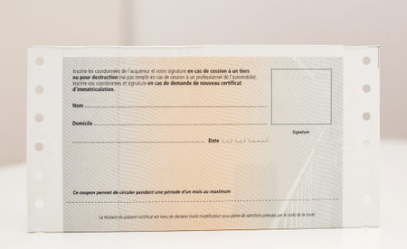 PARIS, FRANCE - OCT 26, 2016: Rear view of vehicle registration certificate (certificat...