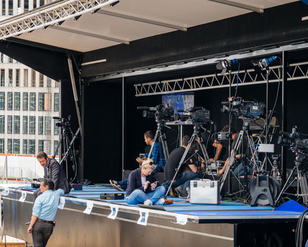 STRASBOURG, FRANCE - JUN 30, 2017: Journalists and TV crew preparing their camera and broadcasting equipment in dedicated press media area for an official event at the European parliamentのeditorial素材