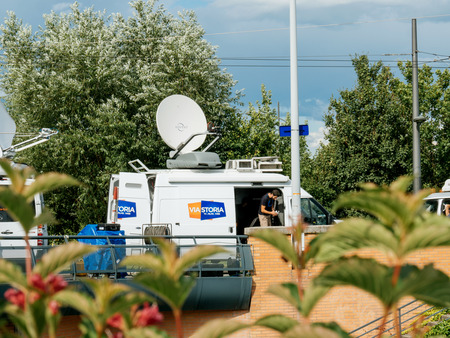 STRASBOURG, FRANCE - JUN 30, 2017: Viastoria Media Television Trucks with multiple Satellite parabolic antennas and fiber optic cables preparing to report live the official European Ceremony of Honour for Dr. Helmut Kohl at European Parliamentのeditorial素材