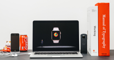 PARIS, FRANCE - SEP 13, 2017: Minimalist creative room  Safari Browser open on MacBook Pro laptop showcasing Apple Keynote website - Apple COO Jeff Williams presenting the Apple Watch 3 congratulations milestonesのeditorial素材