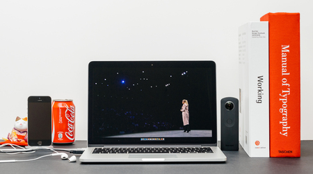 PARIS, FRANCE - SEP 13, 2017: Minimalist creative room with Safari Browser open on MacBook Pro laptop showcasing Apple Keynote website Apple retail chief Angela Ahrendts for a retail-focused update.のeditorial素材