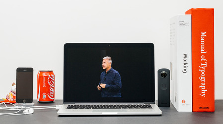 PARIS, FRANCE - SEP 13, 2017: Minimalist creative room and Safari Browser on MacBook Pro laptop showcasing Apple Keynote website with Phil Schiller presenting the new iPhone X 10のeditorial素材