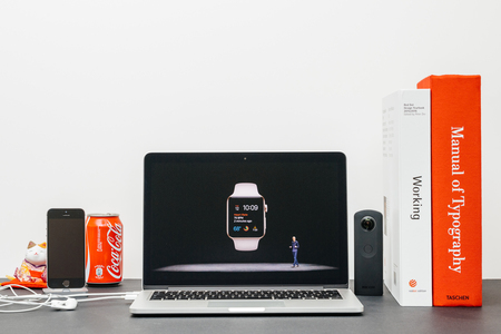 PARIS, FRANCE - SEP 13, 2017: Minimalist creative room  Safari Browser open on MacBook Pro laptop showcasing Apple Keynote website - Apple COO Jeff Williams presenting the Apple Watch 3 heart rateのeditorial素材