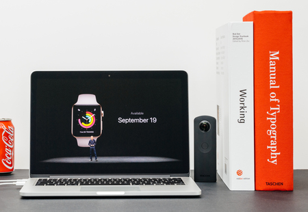 PARIS, FRANCE - SEP 13, 2017: Minimalist creative room  Safari Browser open on MacBook Pro laptop showcasing Apple Keynote website - Apple COO Jeff Williams presenting the Apple Watch 3 available september 19のeditorial素材