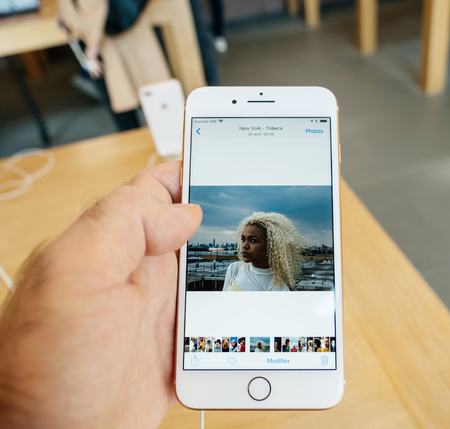 PARIS, FRANCE - SEP 22, 2017: New iPhone 8 and iPhone 8 Plus, as well the updated Apple Watch, Apple TV goes on sale today in Apple Store - point of view at new photos taken with 12 mpx cameraのeditorial素材