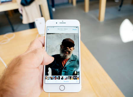 PARIS, FRANCE - SEP 22, 2017: New iPhone 8 and iPhone 8 Plus, as well the updated Apple Watch, Apple TV goes on sale today in Apple Store - point of view at new photos taken with 12 mpx cameraのeditorial素材