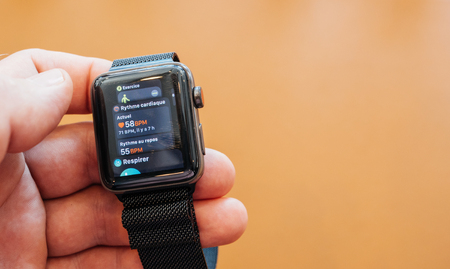 PARIS, FRANCE - SEP 22, 2017: New Apple Watch Series 3 goes on sale in Apple Store with heart rate walking and resting holding watch povのeditorial素材