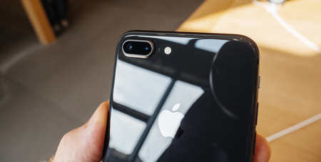 PARIS, FRANCE - SEP 22, 2017: New iPhone 8 and iPhone 8 Plus, as well the updated Apple Watch, Apple TV goes on sale today in Apple Store with customer point of view on the new dual camera led flashのeditorial素材