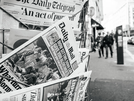 PARIS, FRANCE - OCT 3, 2017: City scene with Daily Mail newspaper at kiosk with socking title and photo at press kiosk about the 2017 Las Vegas Strip shooting in United States with about 60 fatalities and 527 injuriesのeditorial素材