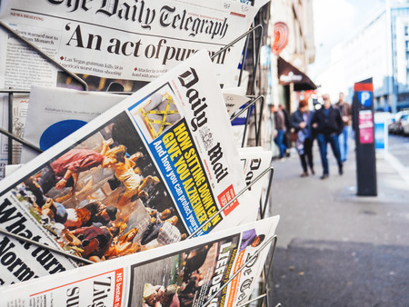 PARIS, FRANCE - OCT 3, 2017: City scene with Daily Mail newspaper at kiosk with socking title and photo at press kiosk about the 2017 Las Vegas Strip shooting in United States with about 60 fatalities and 527 injuriesのeditorial素材