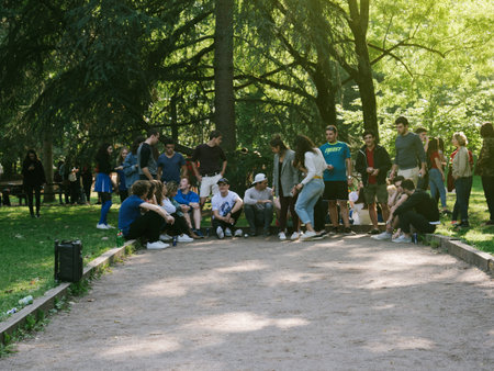 STRASBOURG, FRANCE - SEP 24, 2017: Young people or students  at a team-building event playing petanque and drinking beer in a public parkのeditorial素材