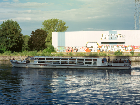 STRASBOURG, FRANCE - JUNE 27, 2017: River cruising boat in Strasbourg on warm summer day - Bateaux de L'ill tourist sightseeing boatのeditorial素材