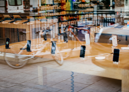 STRASBOURG, FRANCE - NOV 3, 2017: City reflection in glass Apple store windows with latest Apple iPhone X start selling worldwideのeditorial素材