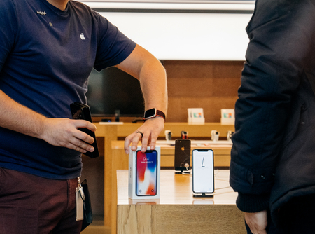 STRASBOURG, FRANCE - NOV 3, 2017: Apple Genius selling the new Apple iPhone X to first customers in France at Apple Storeのeditorial素材