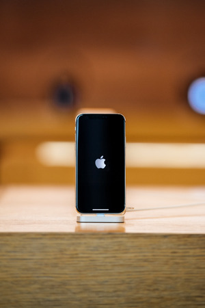 STRASBOURG, FRANCE - NOV 3, 2017: Latest Apple iPhone X goes on sale in Apple Store worldwide - super retina OLED display with demonstration effectsのeditorial素材