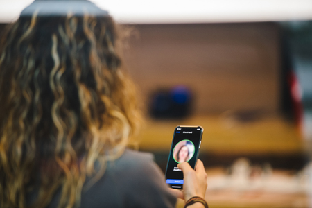 STRASBOURG, FRANCE - NOV 3, 2017: Woman trying Face ID - latest Apple iPhone X goes on sale in Apple Store worldwideのeditorial素材