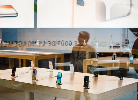 STRASBOURG, FRANCE - NOV 3, 2017: Latest Apple iPhone X goes on sale in Apple Store worldwide - store reflectionのeditorial素材